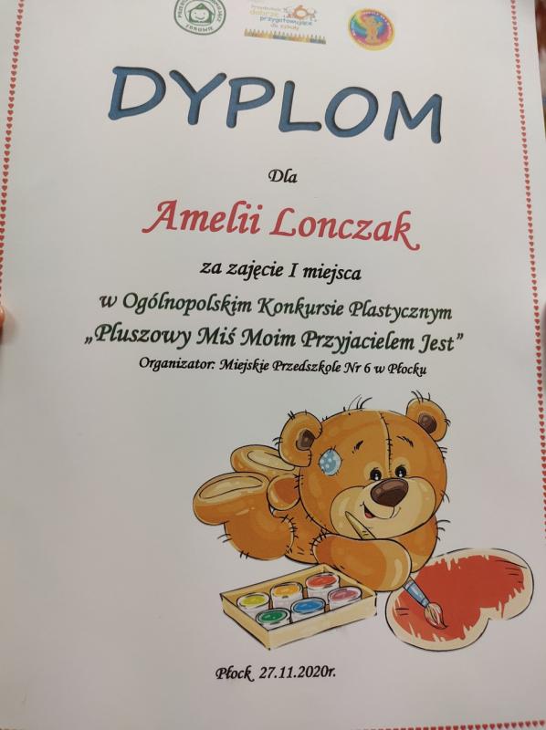 Dyplom Amelii Lonczak za pierwsze miejsce w konkursie ogólnopolskim.