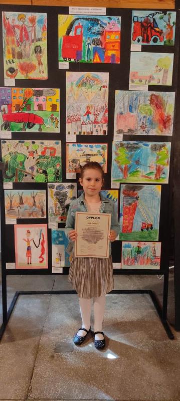 II miejsce Julii Zawiszy Z Samorządowego Przedszkola w Rzemieniu w XX edycji Wojewódzkiego Konkursu Plastycznego WSPÓŁCZEŚNI RYCERZE ŚWIĘTEGO FLORIANA